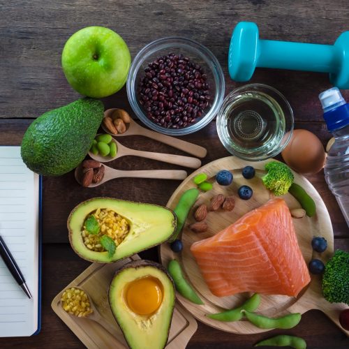 Healthy eating of ketogenic diet meal plan  apple,salmon and avocado with Workout and fitness dieting ,fitness and weight loss concept